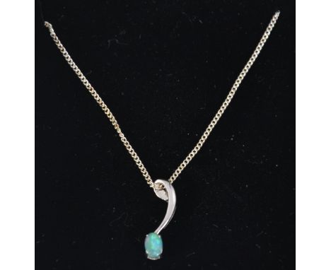 A 925 silver 18ct gold plated and opal pendant necklace by Lovelle. Pendant marked 925, chain marked 18ct rgp. Measures 18 in