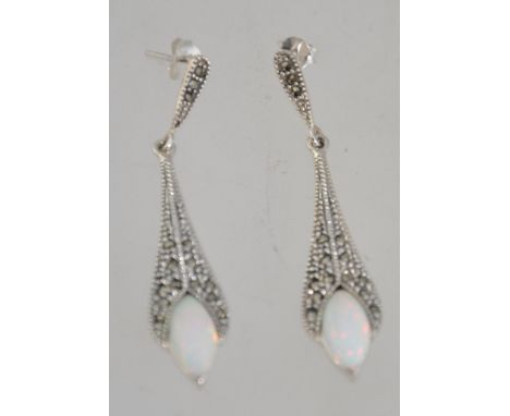 A stunning pair of silver and marcasite opal art deco style earrings  of tapering form. Total weight 6g