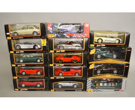14 x Maisto 1:18 scale diecast model cars, various models, including Jaguar, Porsche, Mini, Alfa Romeo, etc. Boxed, overall a