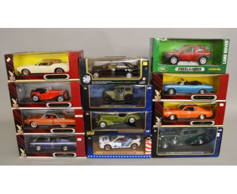 12 1:18 scale die cast model cars. Including Ricko and Road Signature. All boxed G/VG.