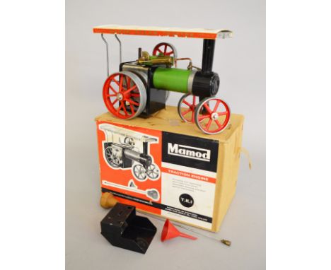 A boxed Mamod T.E.1 Traction Engine, has been fired,drive belt has perished and some wear to paint work, F/G, with two funnel