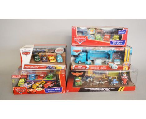 Five Disney Pixar Cars and Planes diecast gift packs, Race Day fan 4 pack, Piston Cup Racers 5 pack, Dinoco 400 8 pack, Dusty