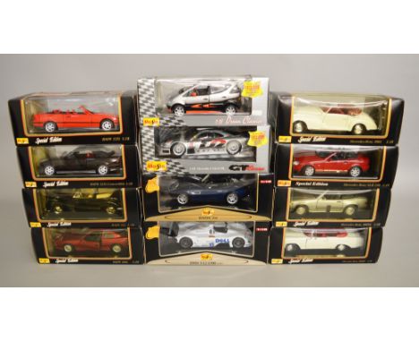 12 x Maisto 1:18 scale diecast model cars, all BMW and Mercedes. Boxed, G-VG.