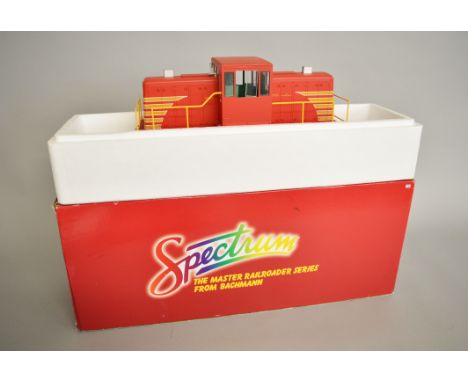 G gauge (1:20.3 narrow gauge). Bachmann Spectrum 81898 GE 45-Ton Side Rod diesel locomotive, red with yellow stripes. Appears