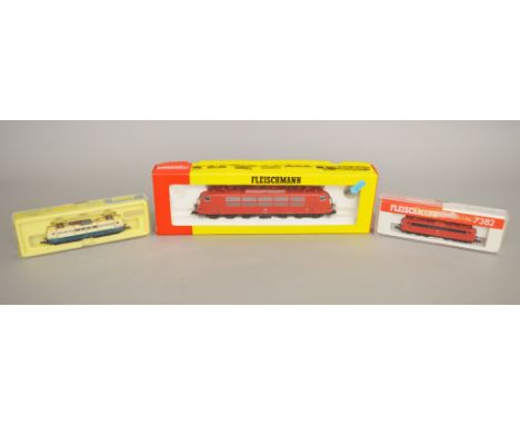 A mixed lot of locomotives: HO gauge Fleischmann 4377 Class 103 DB red electric; N gauge Minitrix 2068 Co-Co Twin Pantograph 