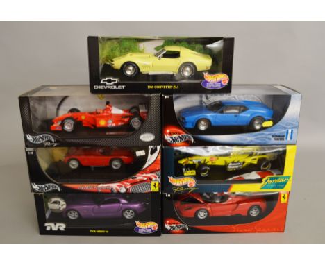 Seven Mattel Hot Wheels 1:18 scale diecast model cars, including: DeTomaso Pantera; Jordan Grand Prix; Chevrolet 1969 Corvett