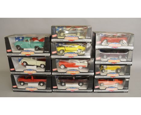 11 x ERTL American Muscle 1:18 scale diecast models. Boxed, G-VG.