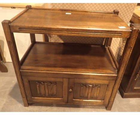 Small oak shelf with cupboard below 