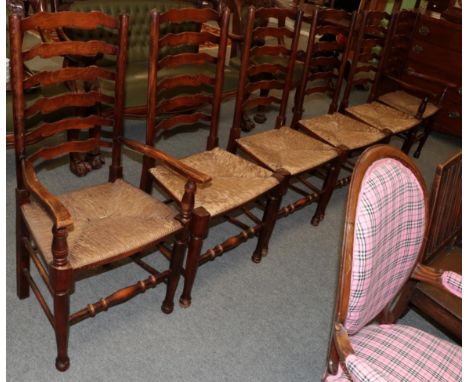Set of six ash and rush seated ladder back chairs, including two carvers