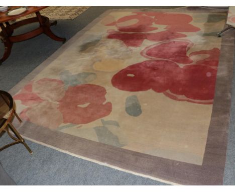 Modernist Finely Knotted Carpet, the polychrome field enclosed by dove grey borders, 308cm by 241cm