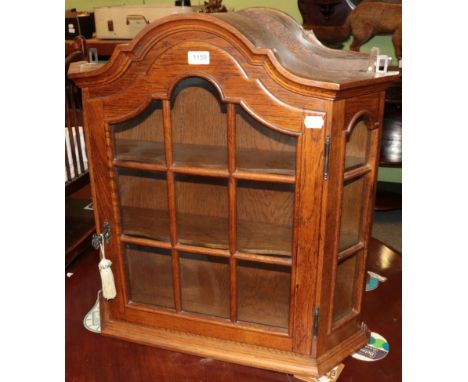A small glazed oak cupboard, and Victorian oak barometer