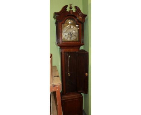 A eight day oak longcase clock, yew wood crossbanded door, arch brass dial, bearing a later description John Gilbertson, Ripo