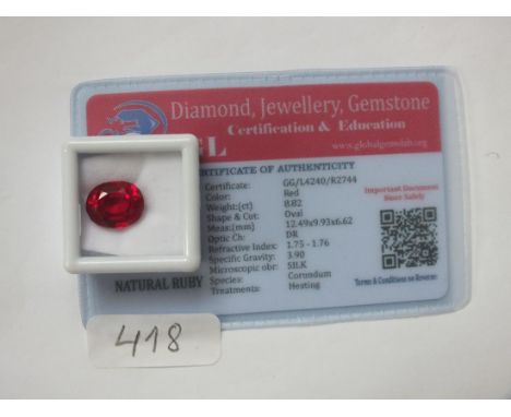 An oval cut unmounted ruby 8.82cts with certificate   of authenticity        