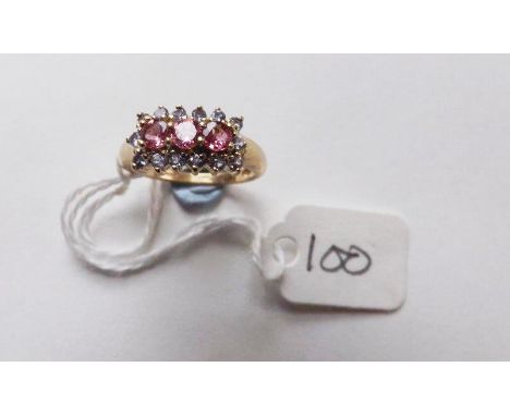 9ct tanzanite and pink sapphire rectangular   cluster ring (size K).        