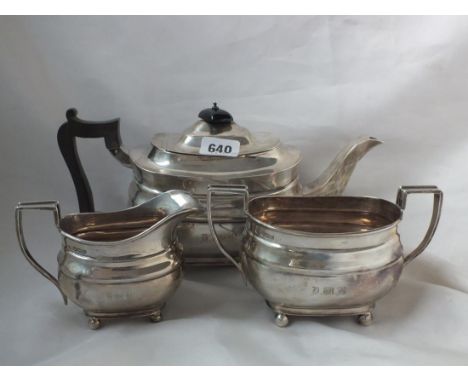 HEAVY THREE PIECE BOAT SHAPED TEA SERVICE,  each raised on ball feet, 11" over spout. Sheff. 1929 by  M &amp; W 1150g.       