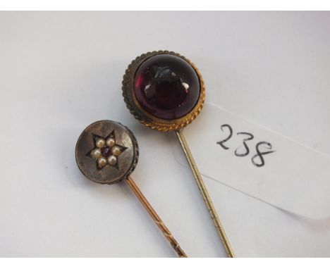 Gold garnet and pearl stick pin and another    