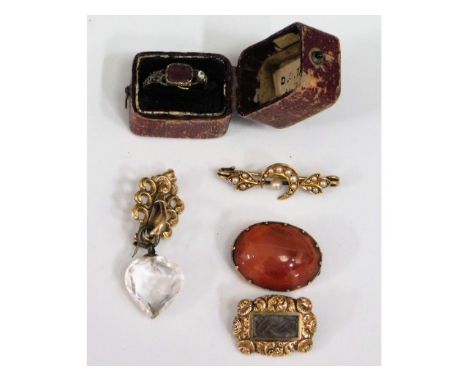 Five pieces of 19thC. jewellery, all test as gold, including a pearl brooch, carnelian brooch, memorial brooch, a crystal sty