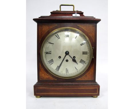 A George III Style Mahogany Bracket Clock, the circular silvered dial with Roman numerals, the rectangular base with inlaid d