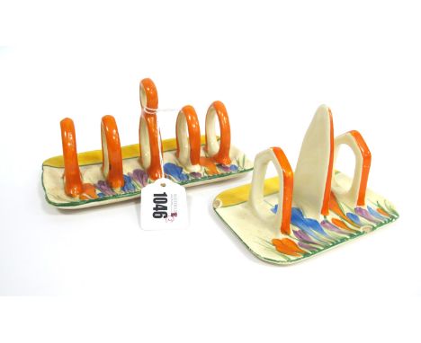 A Wilkinson Ltd Clarice Cliff Five Bar Toast Rack, painted in the Crocus pattern, the shaped rectangular base with a yellow b