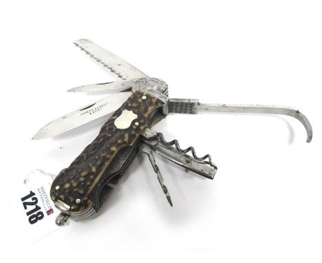 Joseph Rodgers &amp; Sons; A Pocket Knife (Horseman's), with two blades and eleven tools, stag scales, steel bolster and lany