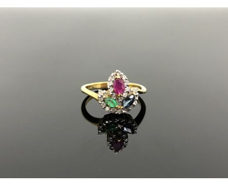 A 10ct gold ruby, sapphire, emerald and diamond set ring, size N