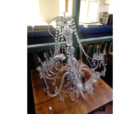 A decorative eight branch light fitting 