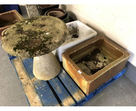 Two ceramic sinks together with a saddle stone