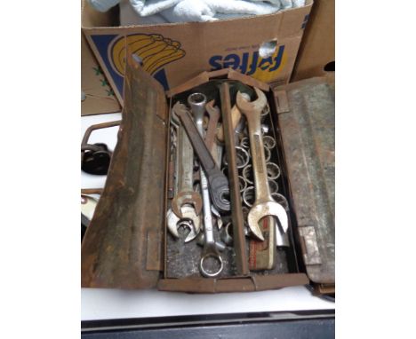 A concertina metal tool box containing spanner and socket tools 