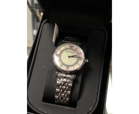 A lady's mother of pearl dialed Emporio Armani wrist watch in retail box 