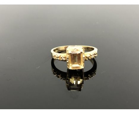 A 10ct gold citrine and diamond ring, size O