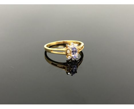 A 10ct gold tanzanite and diamond ring, size N