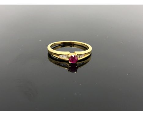 A 10ct gold ruby and diamond ring, size O