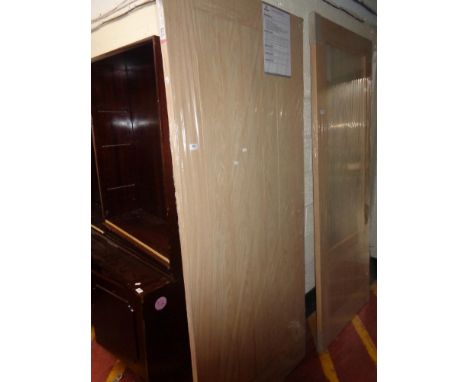 A light oak hardwood interior panel door (new)