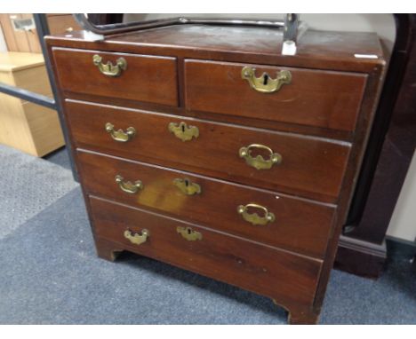 A George III mahogany five drawer chest with brass drop handles on bracket feet 