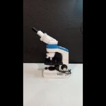 REICHER-JUNG SERIES 150 LAB MICROSCOPE WITH 4 OBJECTIVES