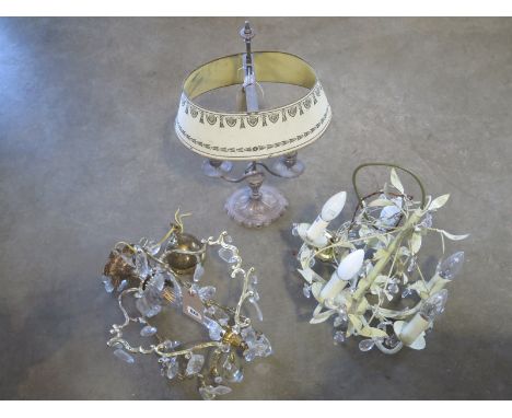 Two small hanging chandeliers and a table light 