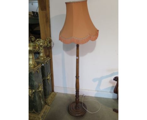 A beech wood standard lamp 