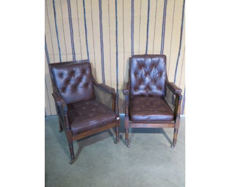 A pair of mahogany caned library bergeres with button leather seat pads - 102cm H x 74cm D x 71cm W