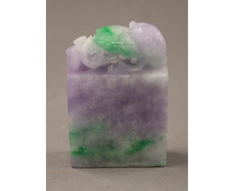 A lavender jade seal. 7 cm high.