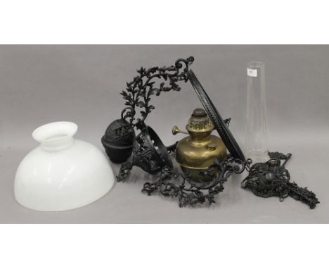 A Victorian hanging oil light with opaline shade. The shade 30 cm diameter.