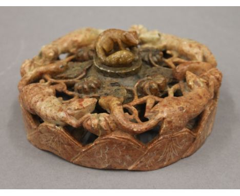 A Chinese soapstone inkwell. 15 cm diameter.