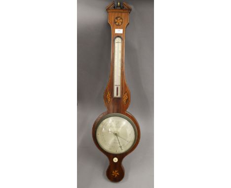 A 19th century inlaid mahogany wheel barometer. 98 cm high.