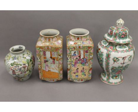 A Chinese vase with six character mark to base; a pair of Chinese vases of square form, with incised stamp to base; and a Chi