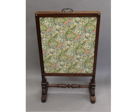 An early 19th century mahogany fire screen. 63.5 cm wide.