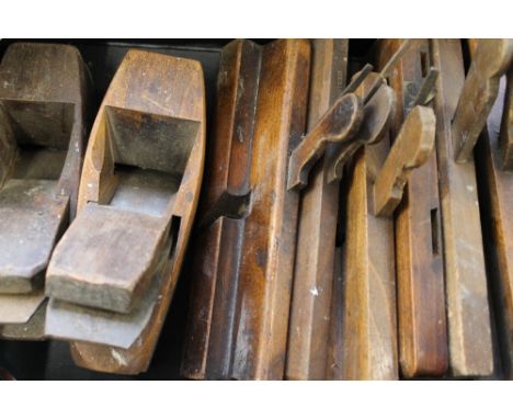 A large quantity of tools, including vintage planes.