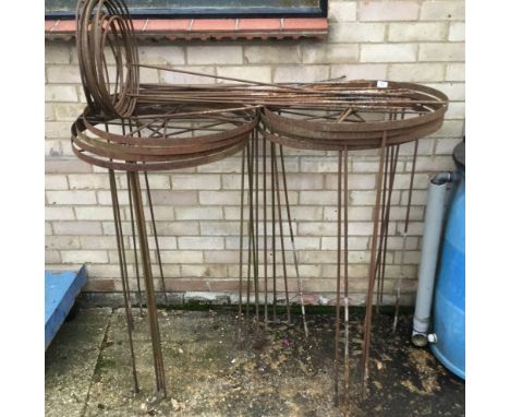 A quantity of vintage iron garden hoops.  (8 three prongs, 14 single prongs). Single prongs approximately 95 cm high, vary fr