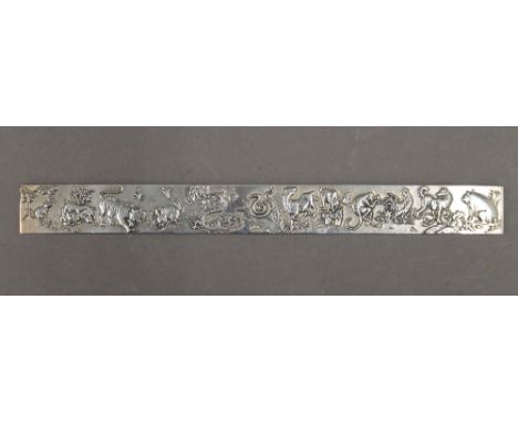 A Chinese silver plated scroll weight. 23 cm long.