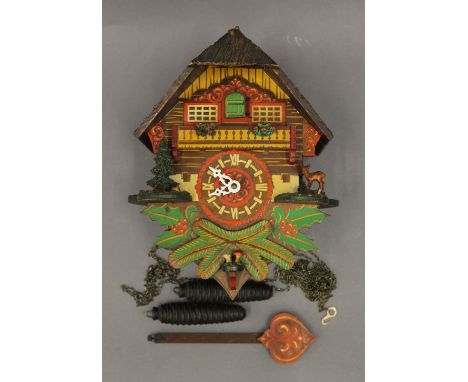 A vintage cuckoo clock. 28 cm high.