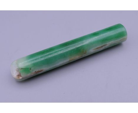 A Chinese jade hat peg. 7.5 cm long.