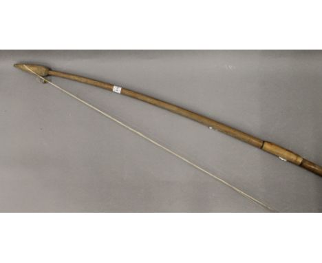 A vintage archery bow. 158 cm long.